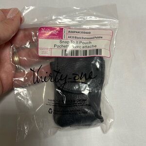 Brand new in package snap to it pouch